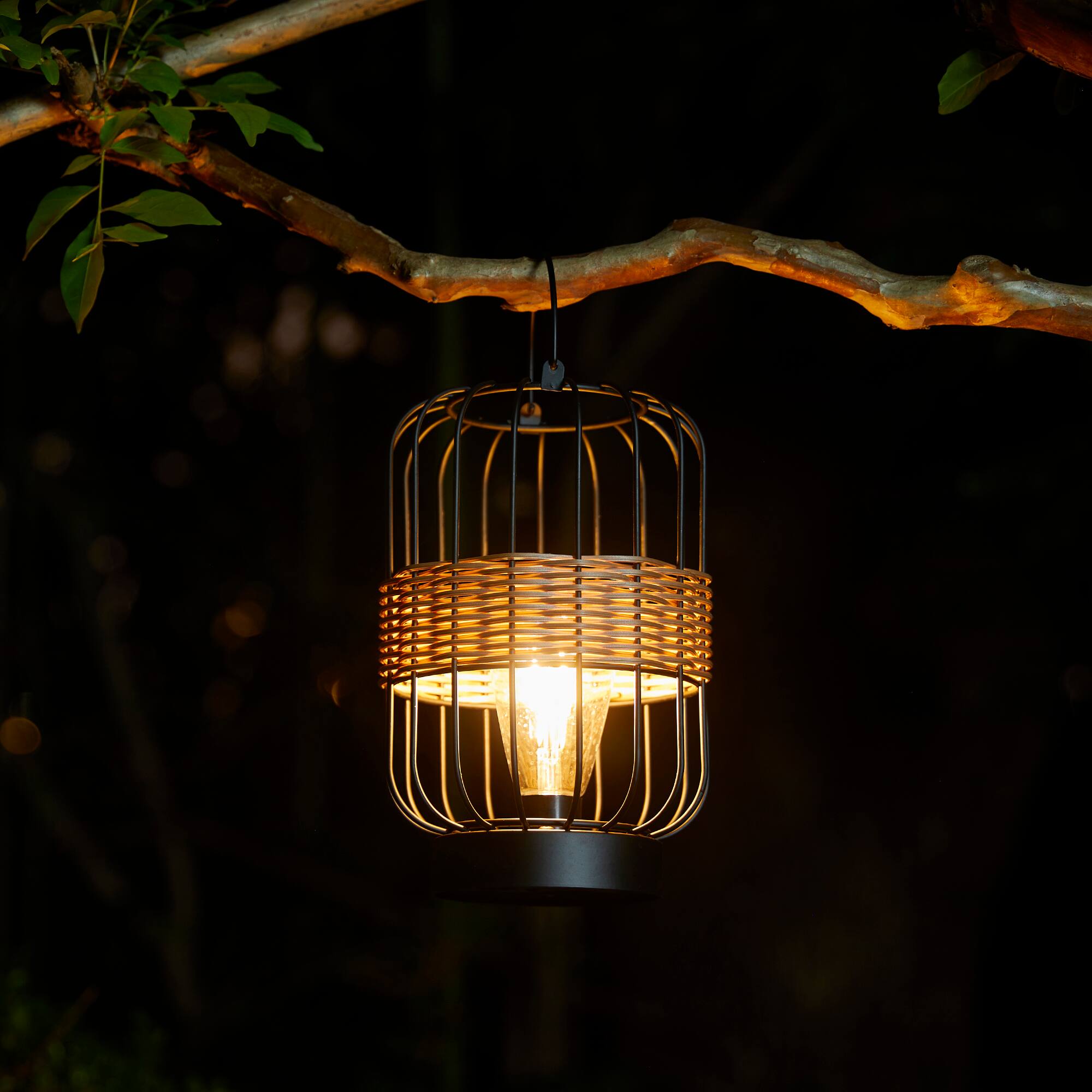 Glitzhome® 11.75" Metal Wire Faux Rattan Solar Powered Outdoor Lantern
